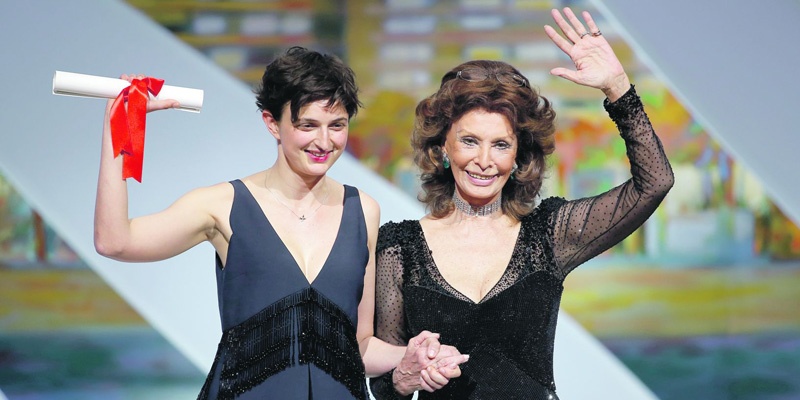 2014年，意大利女导演爱丽丝·洛尔瓦彻（左）的<em>《奇迹》</em>夺得第67届戛纳电影节评审团大奖